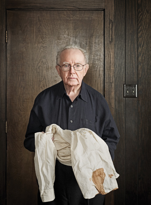 Dr. Robert McClelland Holds the BloodStained Shirt He Wore in the