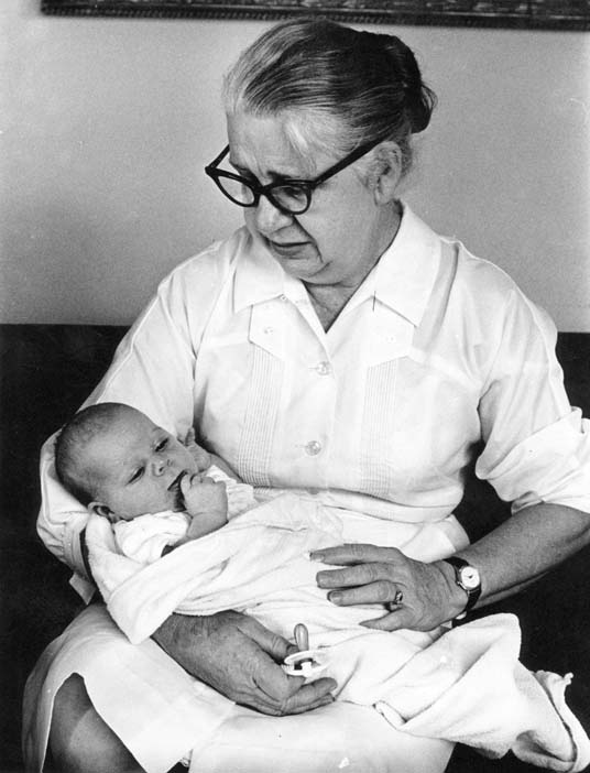 Tearful Marguerite Oswald holds her granddaughter Rachel on the morning after the Kennedy assassination.