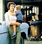 Ruth Paine standing in front of garage in which was stored Lee Oswald's rifle