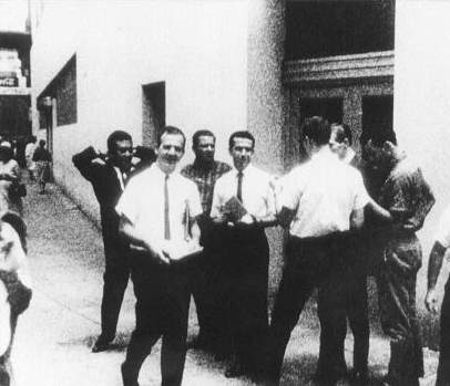 Lee Oswald leafleting in front of International Trade Mart in New Orleans